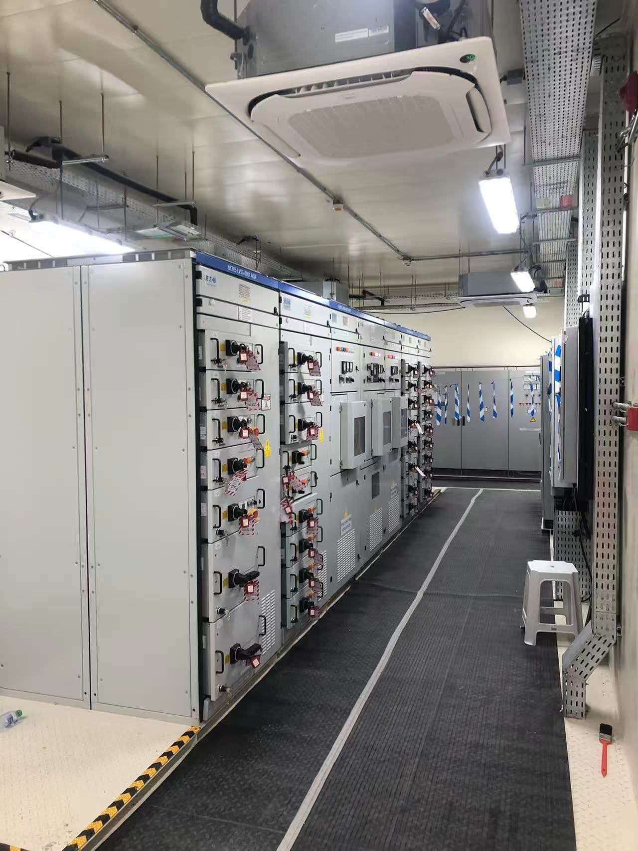 LV and MV switchgear corridor inside a modular electrical house
